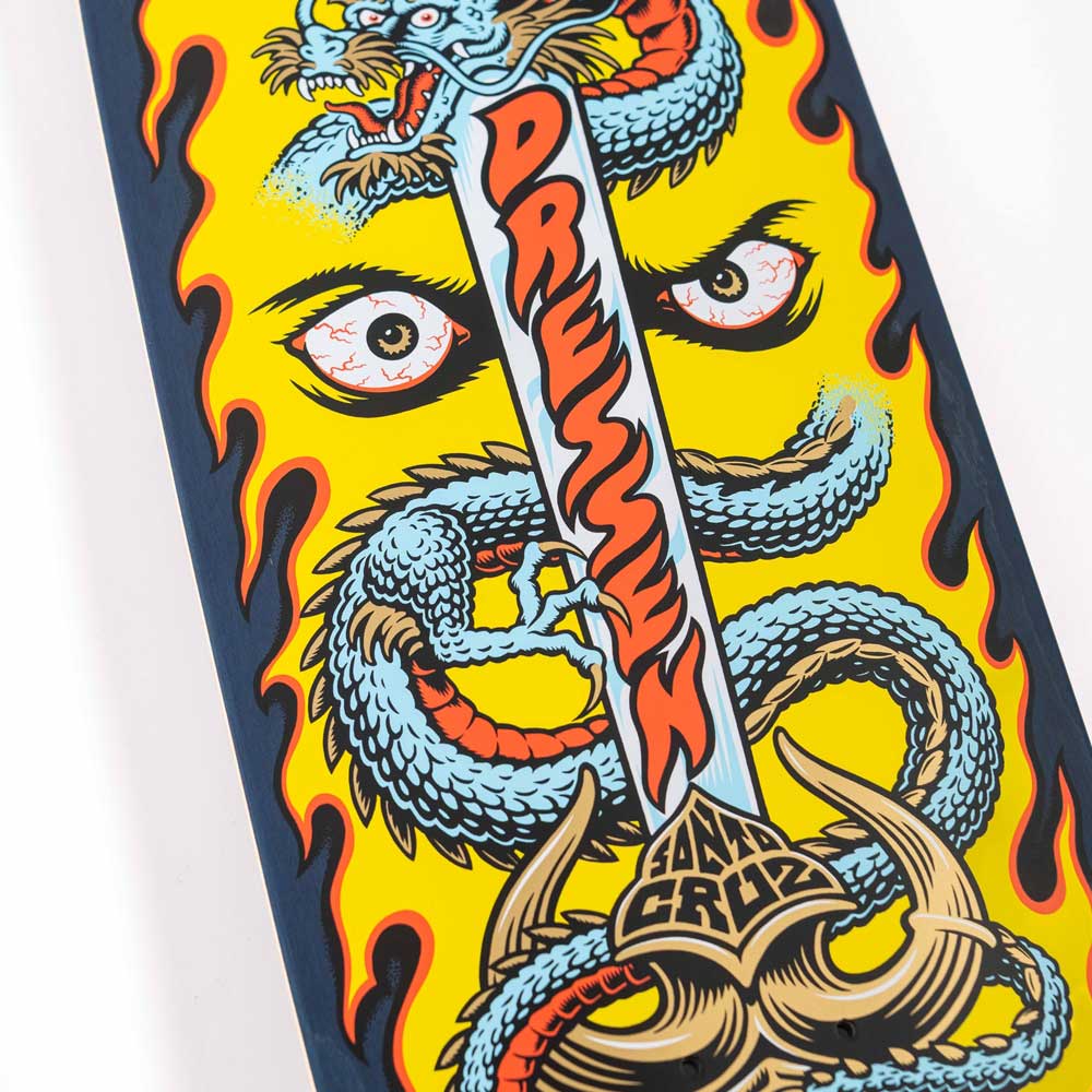 The Dressen Sword Pro Shaped 9.25in x 31.95in Santa Cruz Skateboard features a bold blue dragon entwined with a sword, fiery edge graphics, and the Santa Cruz logo on the hilt, showcasing classic Santa Cruz style.