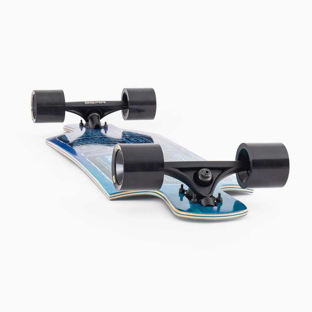A close-up of the Landyachtz Drop Hammer Octomaze Complete Skateboard with black trucks and wheels, blue deck graphic, shot from a low angle on a white background.