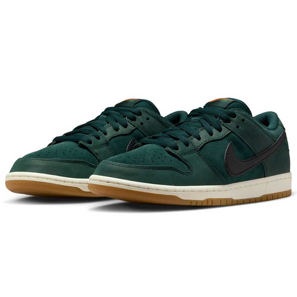 The Dunk Low Pro FJ1674-300 Deep Fir Black Fir Sail Nike SB Suede Shoes feature dark green suede, black swooshes, gum soles, and matching laces—modern style unites with classic sneaker design, showcased on a white background.