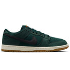The Nike Dunk Low Pro FJ1674-300 "Deep Fir/Black/Fir/Sail" SB suede shoes feature a dark green upper, black swoosh, matching green laces, and a beige sole with gum outsole shown in side profile—a timeless classic sneaker.