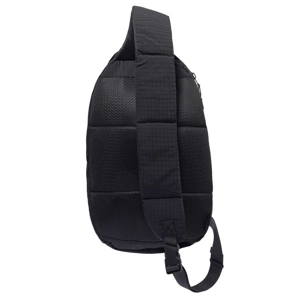 The Express Shoulder Bag Black Butter Goods features a quilted design, wide padded adjustable strap, textured back panel for single-shoulder wear, subtle branding, and comes in the iconic Grass Purple colorway.