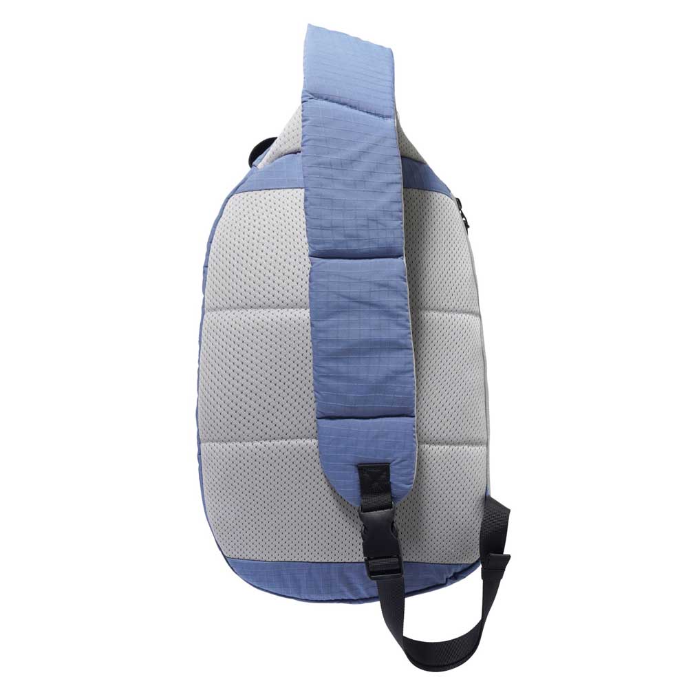 The Express Shoulder Bag Slate Grey by Butter Goods shown from the back, features a blue and gray nylon ripstop design, 10L capacity, a wide single adjustable strap, and secure black buckle.