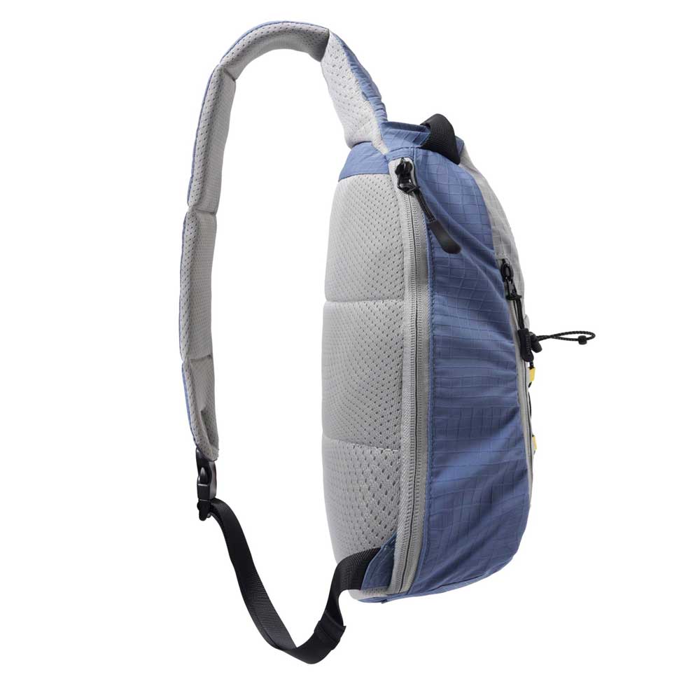 The Express Shoulder Bag Slate Grey by Butter Goods is shown from the side, featuring a blue and gray nylon ripstop design, single adjustable strap, zippered compartments, and a spacious 10L capacity.