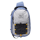 The Express Shoulder Bag Slate Grey by Butter Goods features light blue and gray nylon ripstop, a black mesh front pocket, yellow loops, adjustable strap, black zipper, logo detail, and a rugged 10L outdoor design.