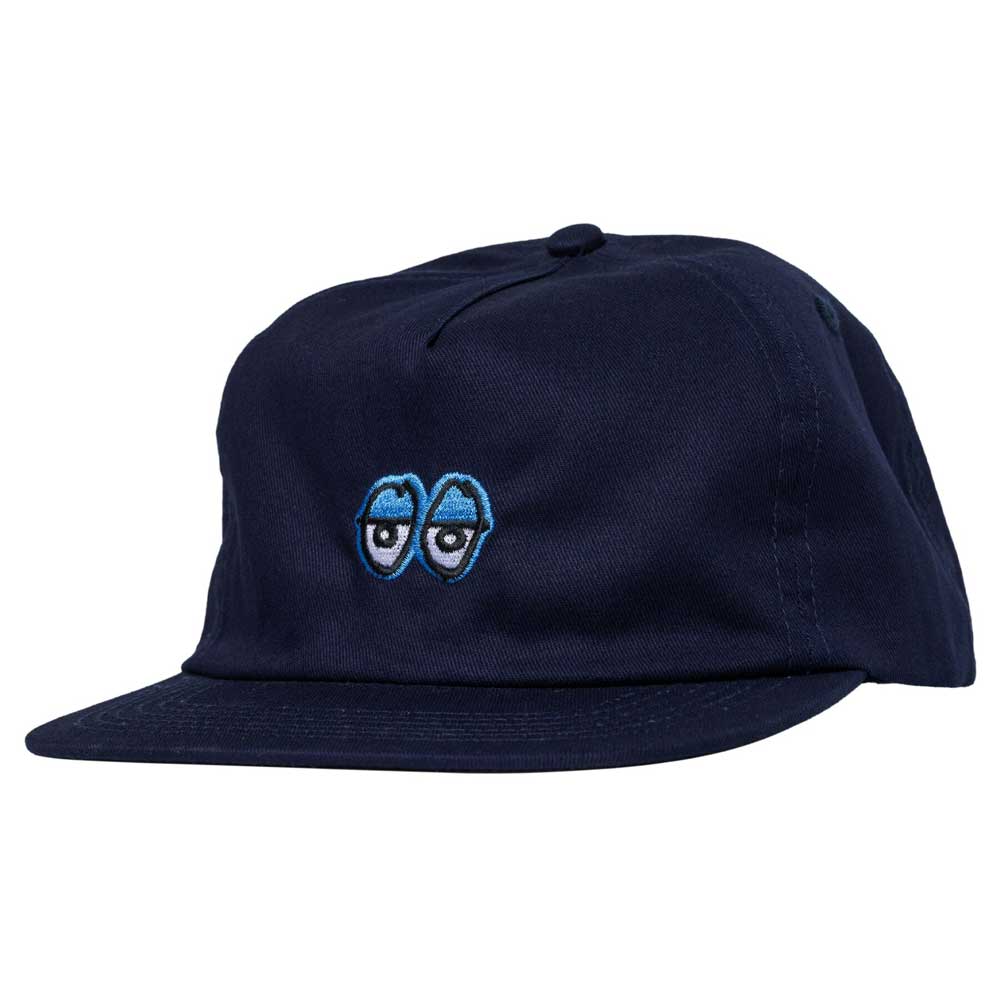 The Eyes Navy Blue Snapback by Krooked Skateboards features an embroidered blue and white cartoon eyes design on the front.