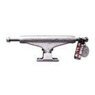 A silver skateboard truck with textured engravings, displayed horizontally. Attached to it is a black and red tag that reads "FA x INDY 169 Hollow Polished Burnt Logo Stage 11," showcasing its likeness to the iconic Independent 169 skateboard trucks from the legendary Stage 11 series, available as a set of two.