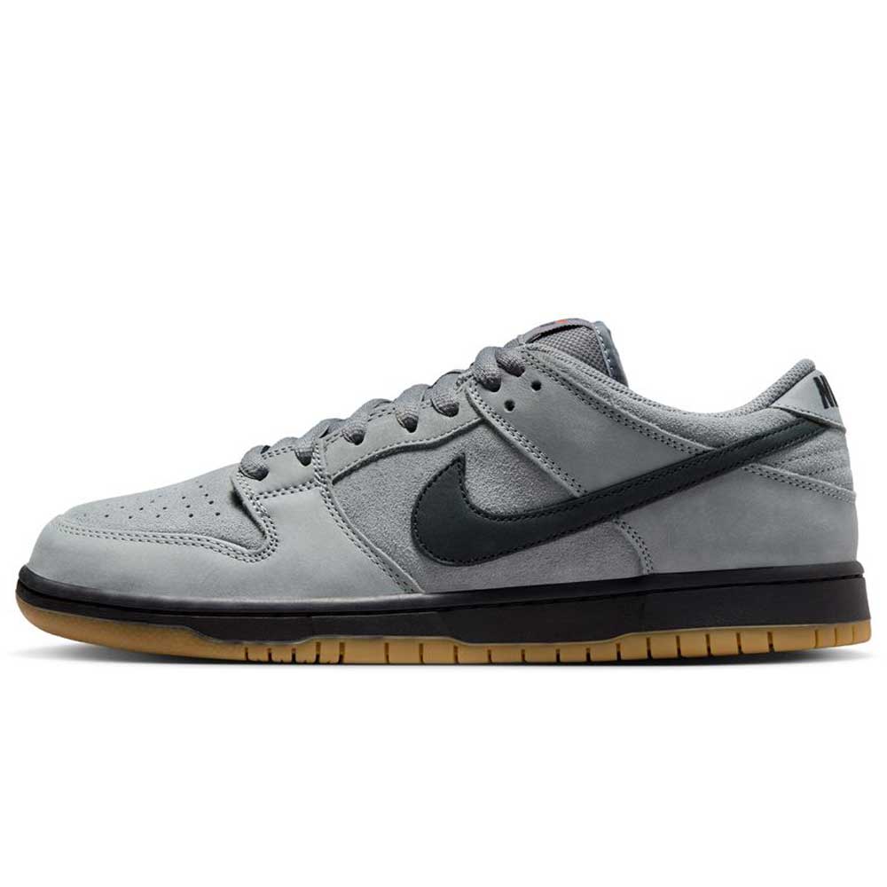 The FJ1674002 Cool Grey Black Nike SB Dunk Low Pro Suede Shoes feature a gray suede upper, black swoosh, gray laces, and a gum sole—ideal for classic sneaker fans.
