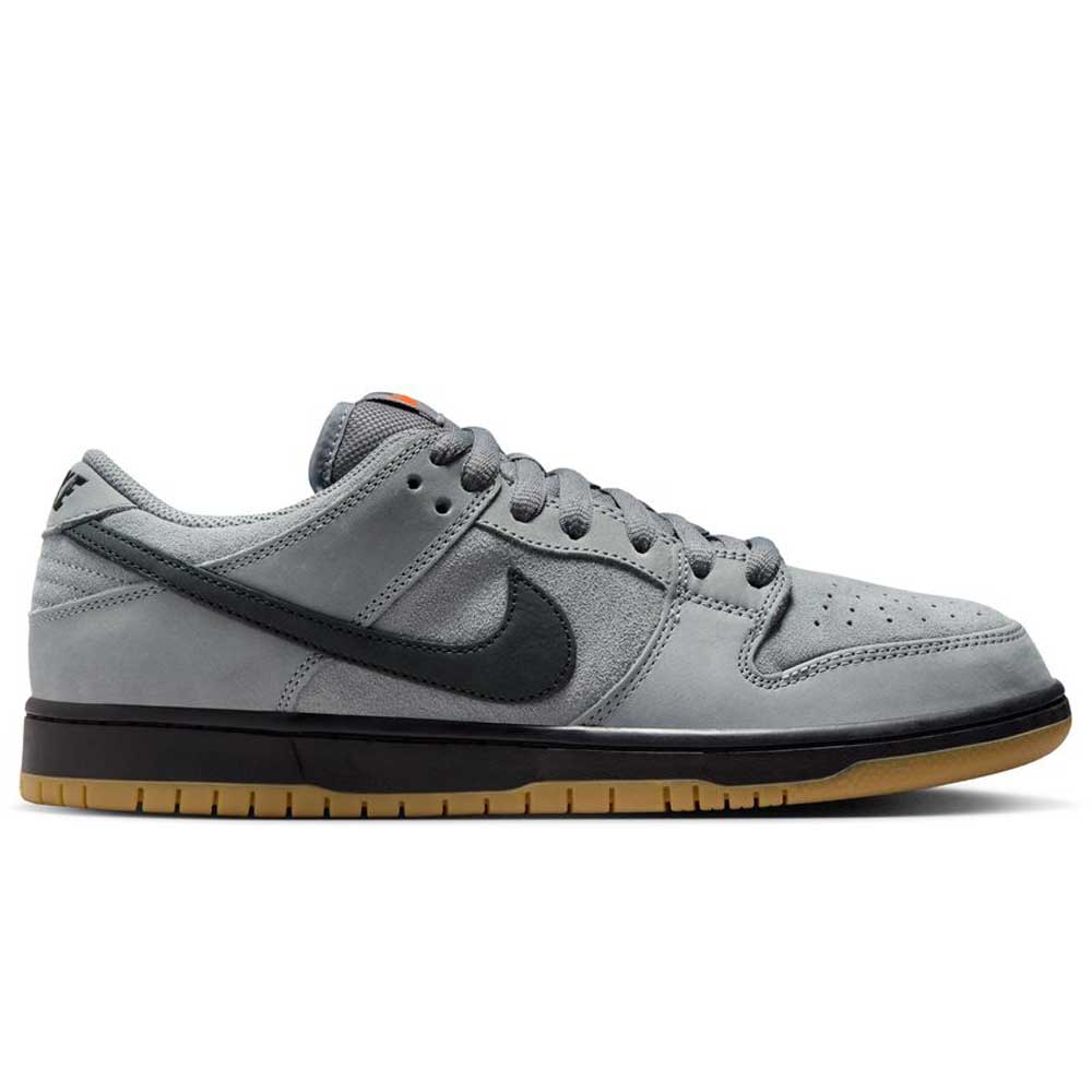 The FJ1674002 Cool Grey Black Nike SB Dunk Low Pro Suede Shoes feature a grey upper, black Swoosh, grey laces, and a light brown gum sole—shown in side profile on a white background, perfect for classic sneaker enthusiasts.
