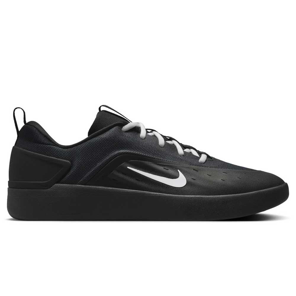 The FQ1273002 Black White Zoom Nyjah 4 Nike SB Skateboarding Shoe features a black mesh upper, white swoosh logo, white laces, and a black sole, displayed in side profile against a white background.