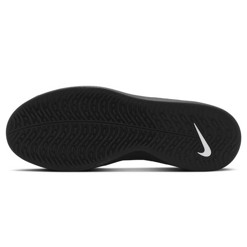 The image shows the black HART outsole of the Nike SB Zoom Nyjah 4 (FQ1273002) skateboarding shoe with a wavy tread and a white Swoosh logo near the heel.