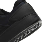 Close-up of the heel and sole of the black FQ1273002 Zoom Nyjah 4 Nike SB skate shoe, showing its textured HART outsole and part of the Nike logo embossed on the heel.