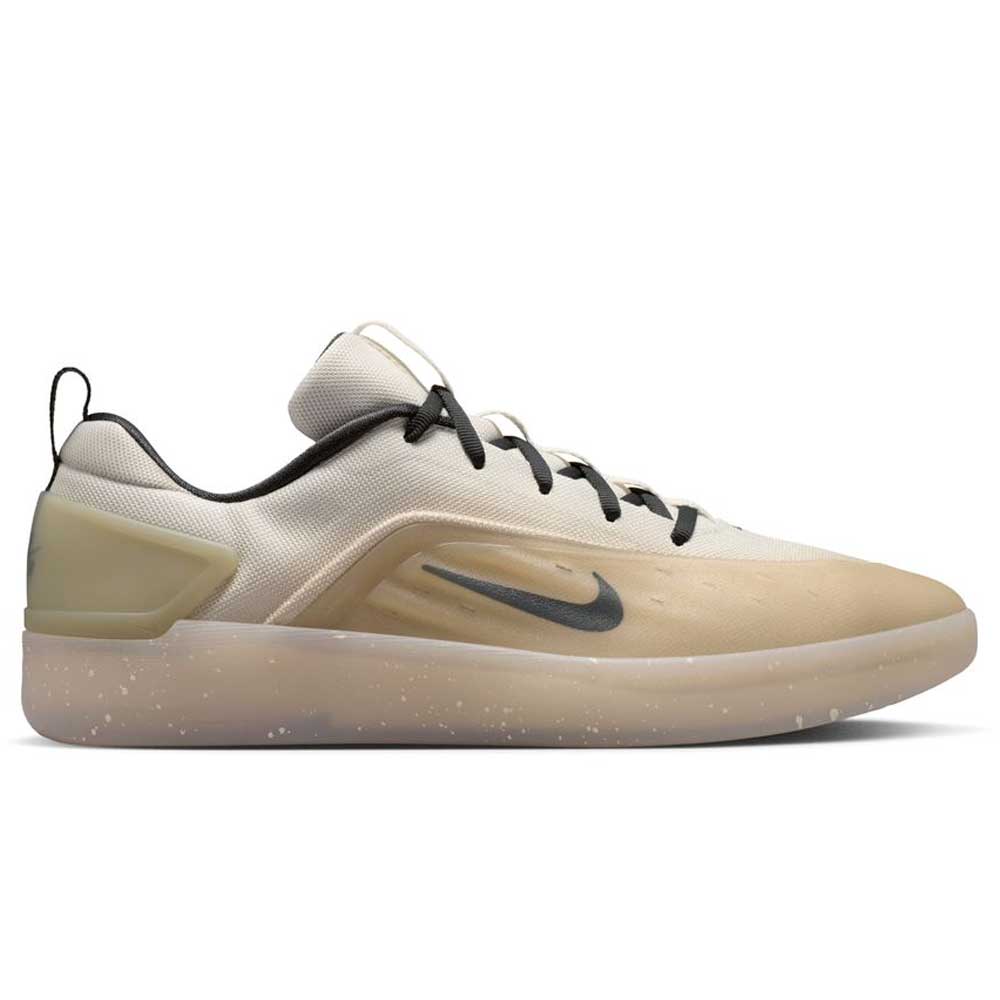 The FQ1273200 Khaki White Zoom Nyjah 4 Nike SB skateboarding shoe features a beige and cream design with a black swoosh, speckled translucent HART outsole, reinforced mesh upper, and low-top profile, shown from the side.