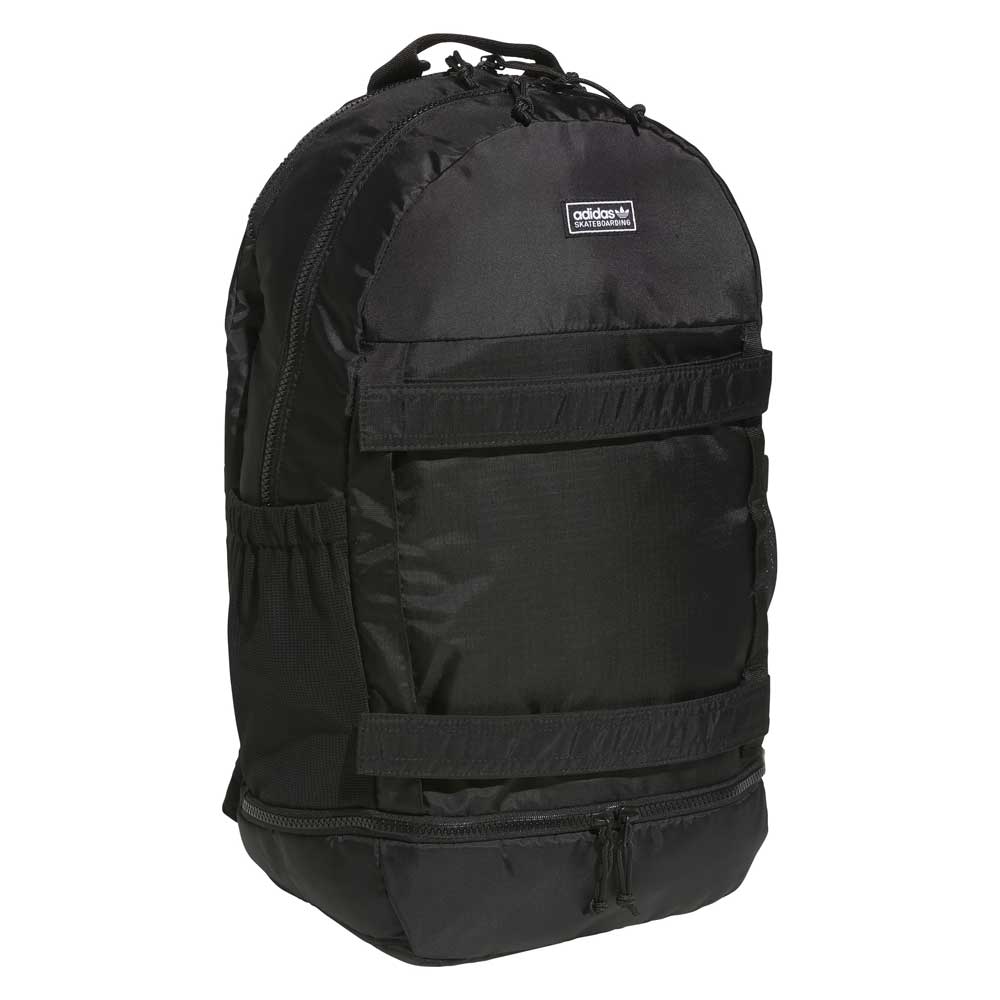 The FSBS Backpack KS6814 Black from Adidas Skateboarding is a versatile backpack featuring a zippered main compartment, front zipper pocket, side pockets, and a small Adidas logo patch on the front—ideal for daily use or as your go-to skateboarding backpack.