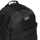 Close-up of the FSBS Backpack KS6814 Black by Adidas Skateboarding, featuring a prominent front pocket, double zippers, and a small Adidas brand label on the upper section—ideal as an everyday backpack for your essentials.