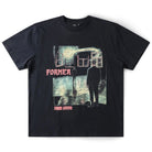 The Mind Glass Former Tee Black is a black 200GSM cotton T-shirt with a screen print graphic of two silhouetted figures facing each other in front of a building, large pink “FORMER” lettering, and smaller text reading “Former Apparel Former Apparel” for a modern vintage vibe.