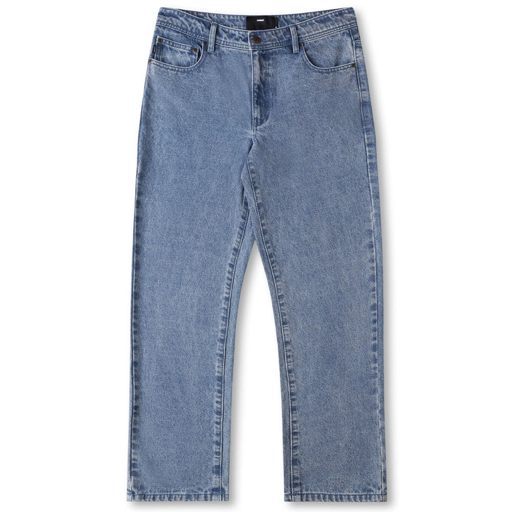 A pair of Crux Denim Pant Washed Blue Former jeans laid flat, crafted from 100% cotton denim and featuring a straight-leg cut, front button, zip fly, and five-pocket design.