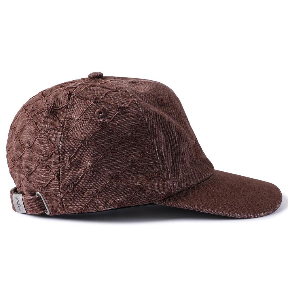 The Alleviate Cap Former Hat Bark is a brown baseball cap with a quilted pattern and an adjustable back strap, inspired by classic vintage T-shirt style, displayed from a side angle against a white background.