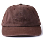 The Alleviate Cap Former Hat Bark is a brown baseball cap featuring the word FORMER embroidered in matching brown thread on the front, crafted from durable 200GSM cotton for a premium feel.