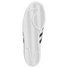The GW6930 White Black Superstar ADV Adidas Skateboarding Leather Shoes feature a white rubber sole with herringbone tread, seen from below, plus partially visible black and white upper edges—ideal for skateboarding.