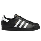 The GW6931 Black White Superstar ADV Adidas Skateboarding Leather Shoes feature a black leather upper, white stripes, black laces, a white heel tab, and gold "SUPERSTAR" on the side—combining classic shell toe style with skateboarding performance.