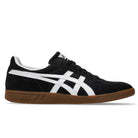 The Gel Vikka Pro Asics Black Brown 1201A486 Suede Skateboarding Shoe is featured in a side profile on a plain white background, showcasing its black suede upper with signature white Asics stripes, white lining, and brown rubber sole. Designed for superior board control, this versatile sneaker blends classic style with dependable skate performance.
