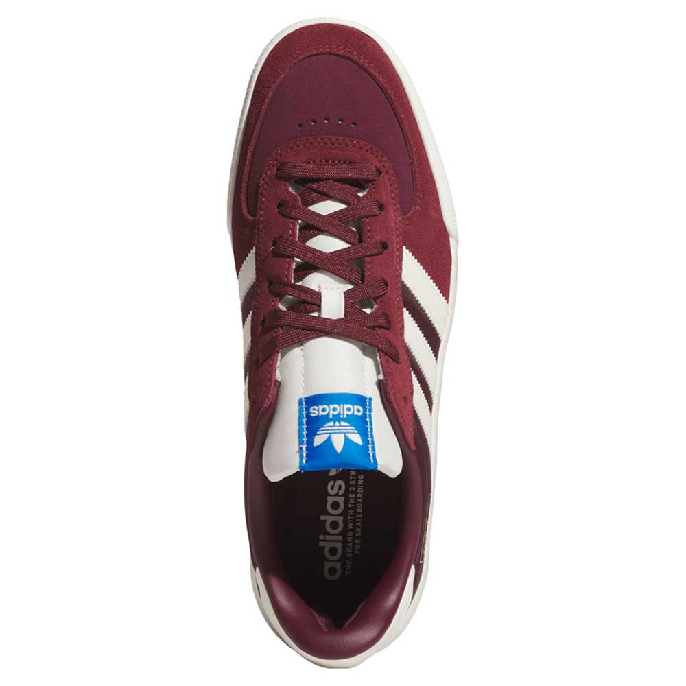Top view of the Glenburn Burgundy White KJ5048 Adidas Skateboarding Shoes featuring maroon uppers with signature white stripes, a white sole, and a blue adidas logo tag on the tongue—these sneakers are perfect for everyday wear and make a stylish addition to any skateboarding shoe collection.