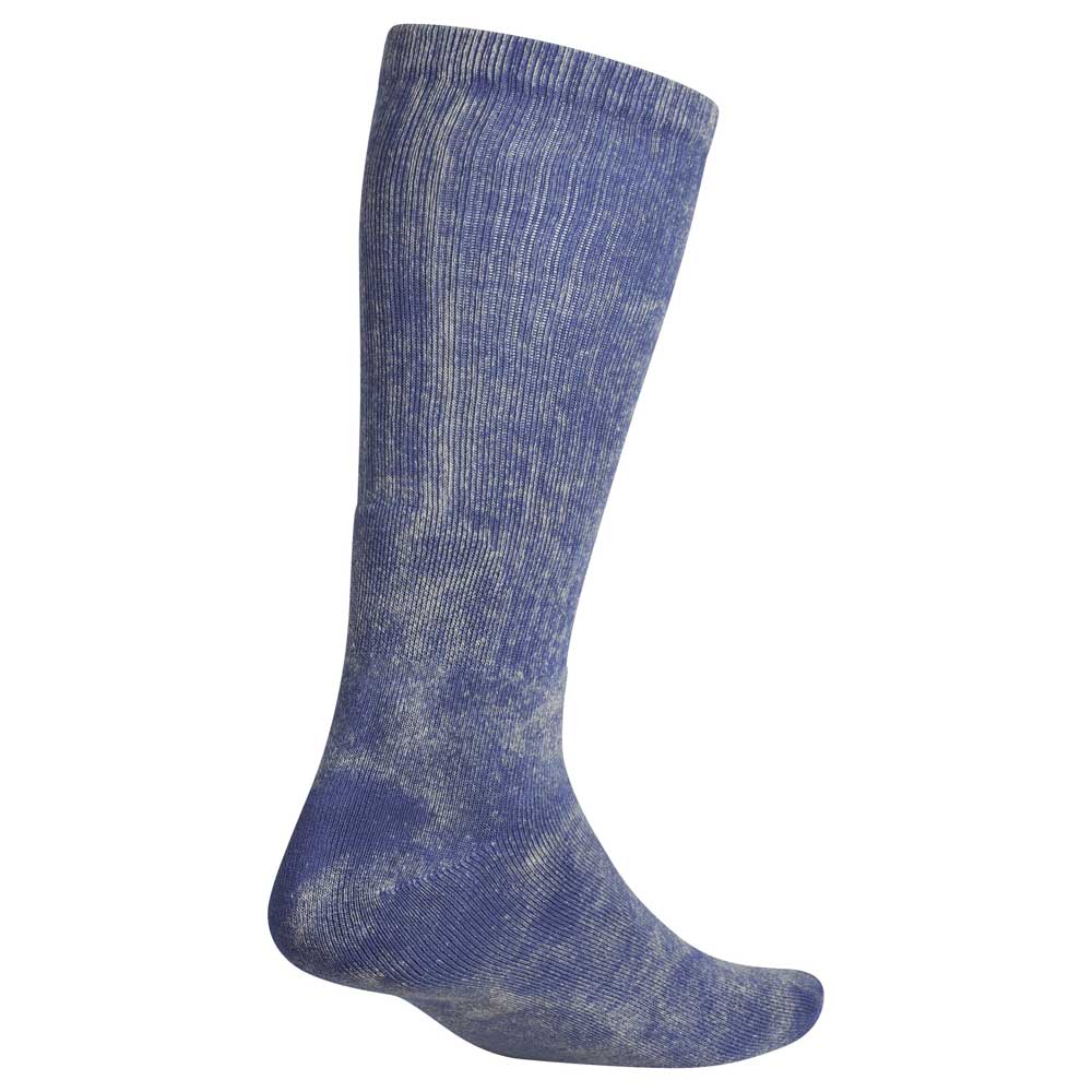 The Gonz Art Sock KS6804 Adidas Skateboarding 1 Pair is shown knee-high from the side in blue and white speckles, highlighting the heel, ankle, and a slightly bent shape to illustrate its fit on a foot and lower leg.