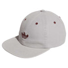 The Gonz Cap Gray Burgundy KS6800 by Adidas is an adjustable hat in light grey, featuring maroon embroidered eyelets and a bold stylized bird logo with outstretched wings for a sporty, comfortable style.