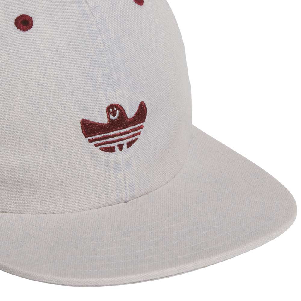 A close-up of the Adidas Gonz Cap Gray Burgundy KS6800, an adjustable light gray hat with a red embroidered bird logo and three horizontal stripes, highlighting its unique style.