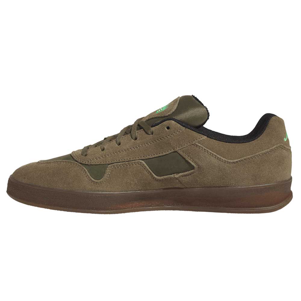 Gray and black Mark Gonzales KJ0281 Aloha Super Suede Skateboarding Shoes by adidas, featuring a premium suede and textile upper for enhanced durability and style. Shown in a side profile view on a white background, these shoes are inspired by skate culture.