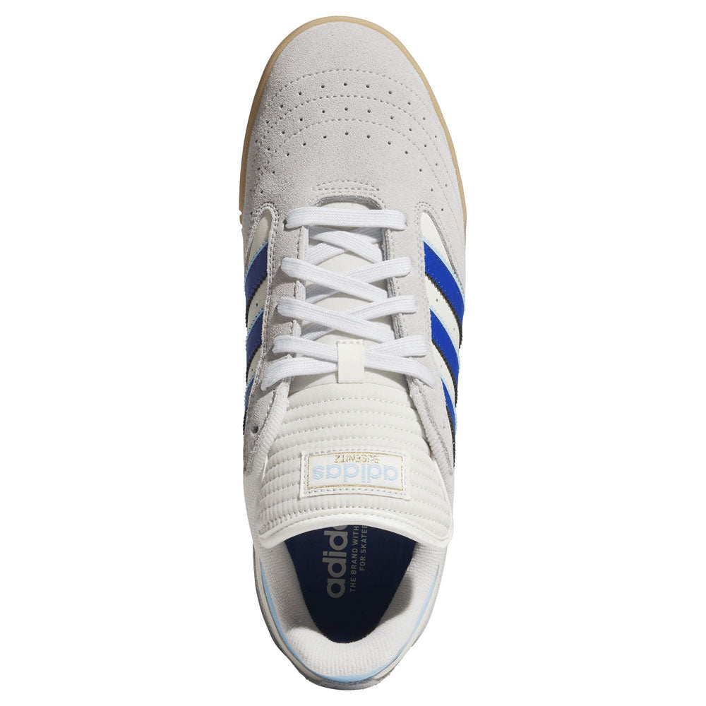 Top view of the Gray Royal Blue KZ8895 Busenitz Indoor Adidas Skateboarding Suede Shoes, featuring royal blue stripes on a gray and white upper, white laces, a gum sole, and perforated detailing on the toe. This footwear displays the adidas logo in blue and yellow on the tongue.