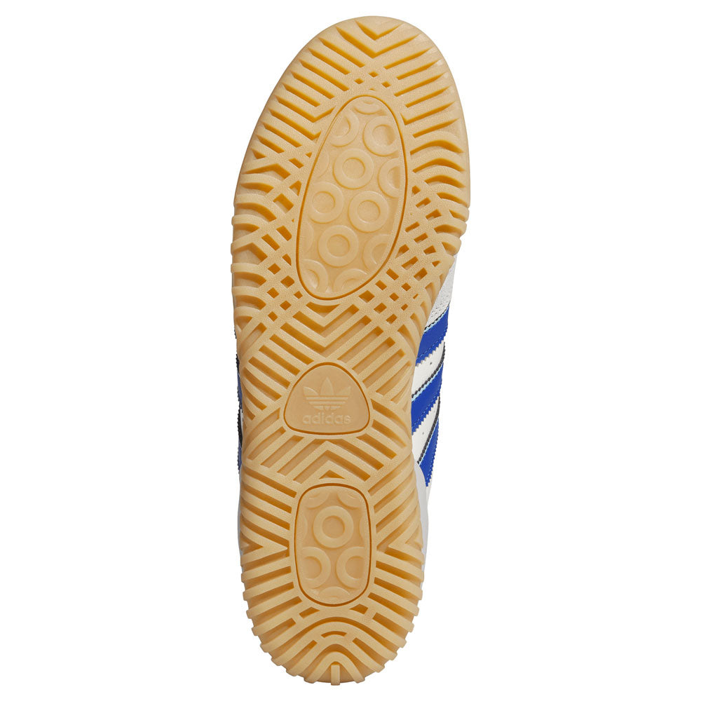 The gum sole of the Gray Royal Blue KZ8895 Busenitz Indoor Adidas Skateboarding Suede Shoe displays a detailed tread pattern featuring circles and zigzags, with the adidas logo at the center. Blue and white stripes run along the side of this footwear.