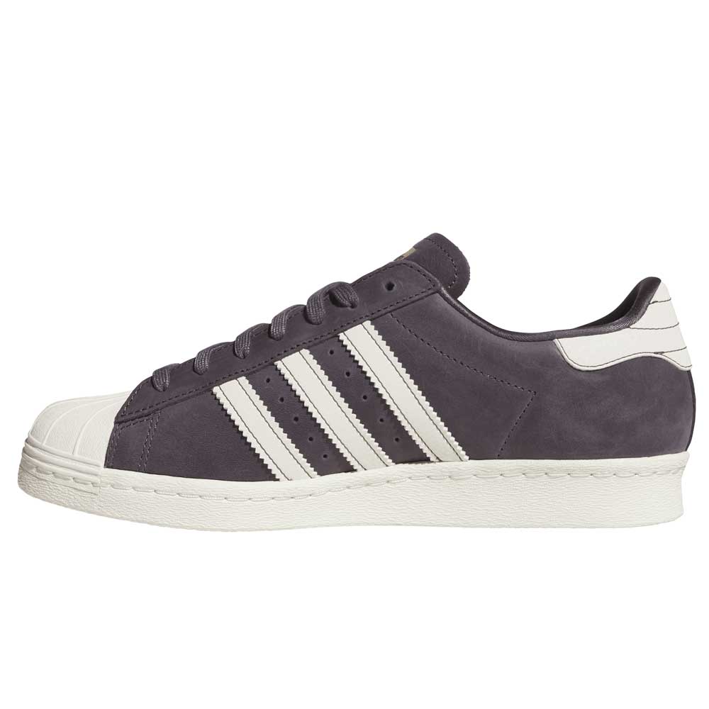 Side view of the Grey White Superstar 80 ADV HQ9289 Adidas Skateboarding Leather Shoes, showcasing white stripes, a white heel patch, and a sturdy rubber sole—combining classic adidas style with skate-ready performance.