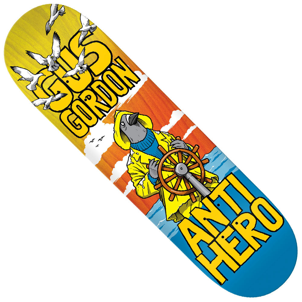 The Gus Gordon 8.5x32.25 Full SE Anti Hero Skateboards Deck showcases a cartoon pigeon in a yellow raincoat steering a ship’s wheel, accompanied by seagulls overhead and bold Gus Gordon and Anti Hero lettering. Measuring 8.5x32.25 inches, this deck combines eye-catching style with excellent functionality for your next ride.
