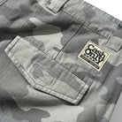 Close-up of Halfway Shorts Grey Camouflage Ripstop (COD152601), featuring baggy fit, flap pockets, and a rectangular patch above reading "Cash Only" in bold with smaller text below.