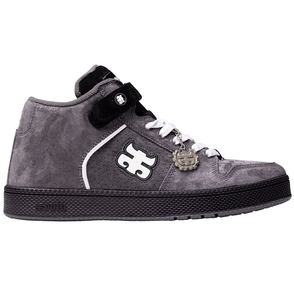 The Grasshopper Gray Suede I Path Shoes Skateboarding features a gray suede upper, black sole, white and black IPATH logo on the side, black strap, white laces, and a metallic charm attached to the laces. This stylish skateboarding shoe is inspired by the Grasshopper and is showcased against a clean white background.