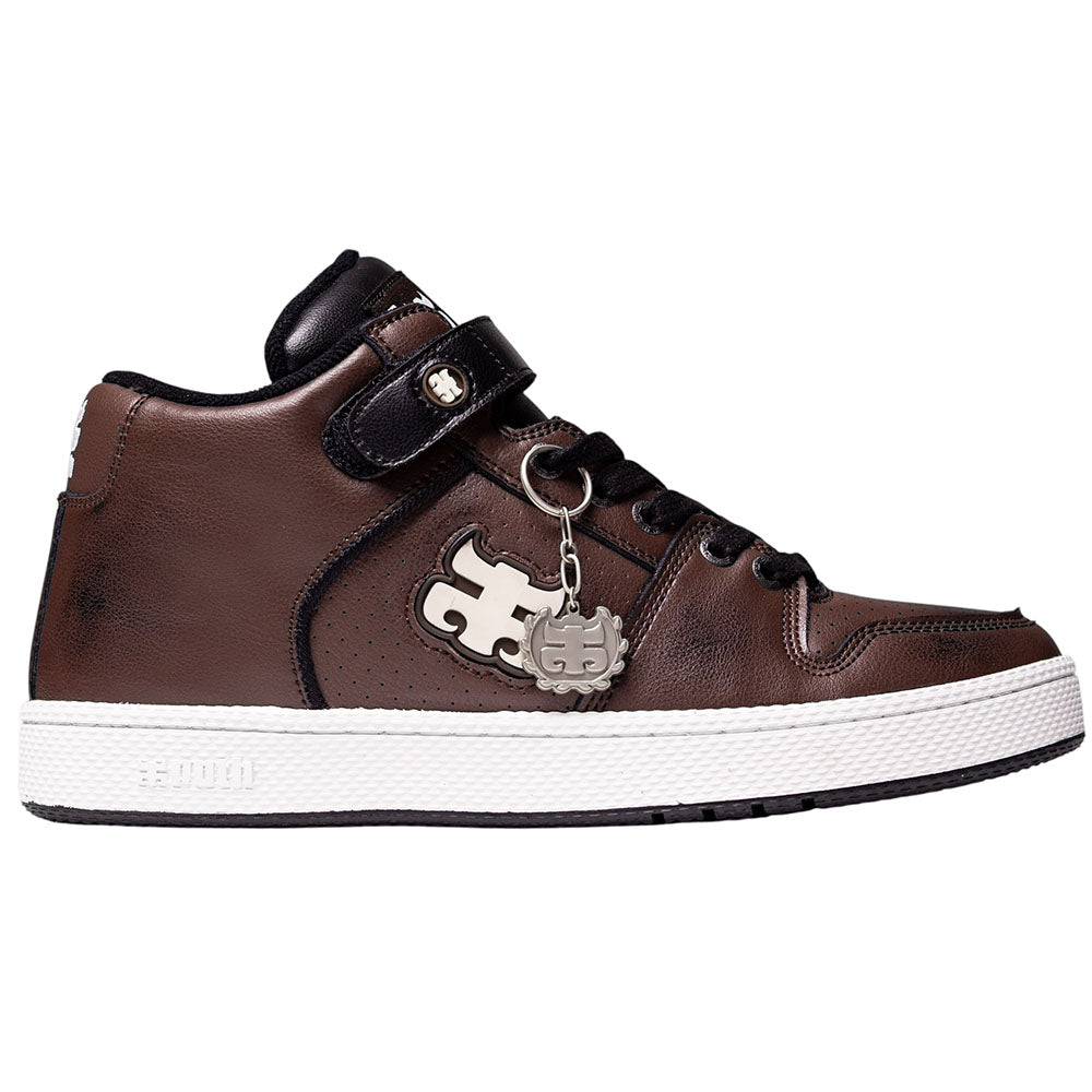 The Grasshopper Brown Leather I Path Shoes Skateboarding is a brown and black high-top sneaker showcasing Grasshopper brown leather accents, a white sole, and a silver puzzle piece keychain attached to the laces, viewed from the side.