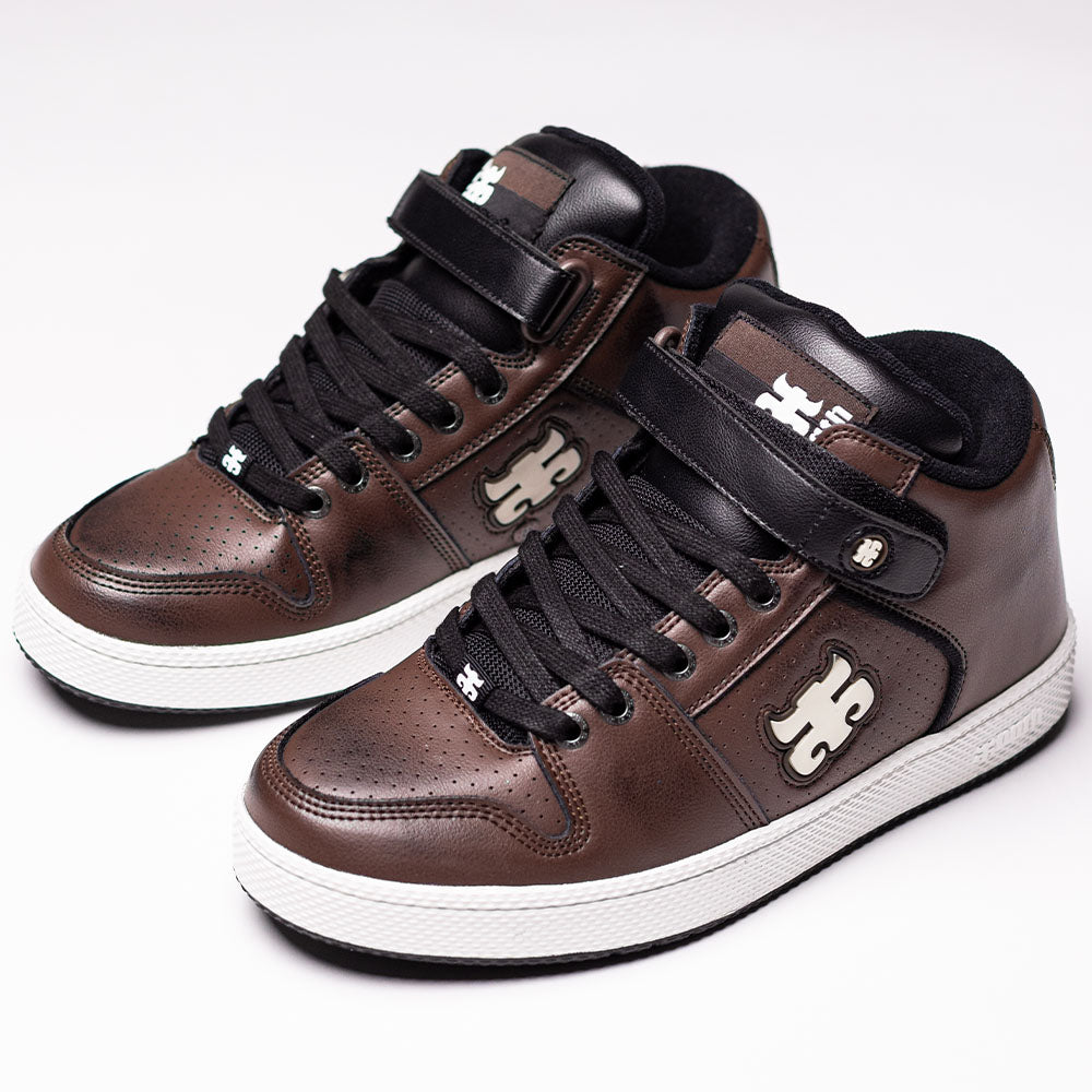 Grasshopper Brown Leather I Path Shoes Skateboarding feature a high-top design in brown and black with white soles, black laces, and a puzzle piece logo on the side and tongue. Crafted from Grasshopper brown leather, these sneakers are photographed on a white background.