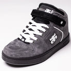 Grasshopper Gray Suede I Path Shoes Skateboarding feature a classic high-top silhouette in premium grey suede, accented with white laces, a black sole, and a distinctive black ankle strap. Showcasing subtle Grasshopper inspiration, these shoes display the iconic puzzle piece logo on the side and tongue, while bold black and white details add standout appeal.