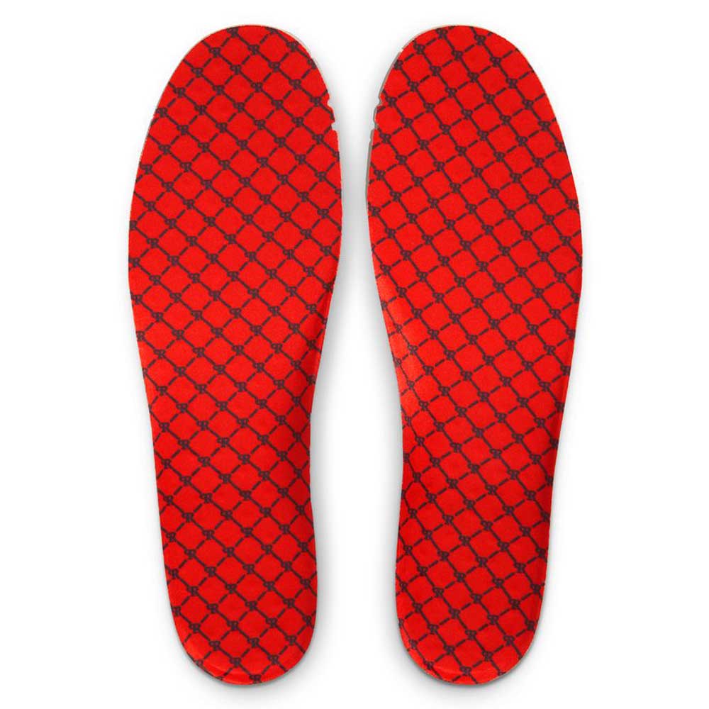 A pair of IQ5648600 Habanero Red Club Gold Team Red Paul Rodriguez Zoom Air Low Nike SB suede skateboarding shoes, with a repeating black hexagonal pattern on the red insoles, are placed side by side on a white background.