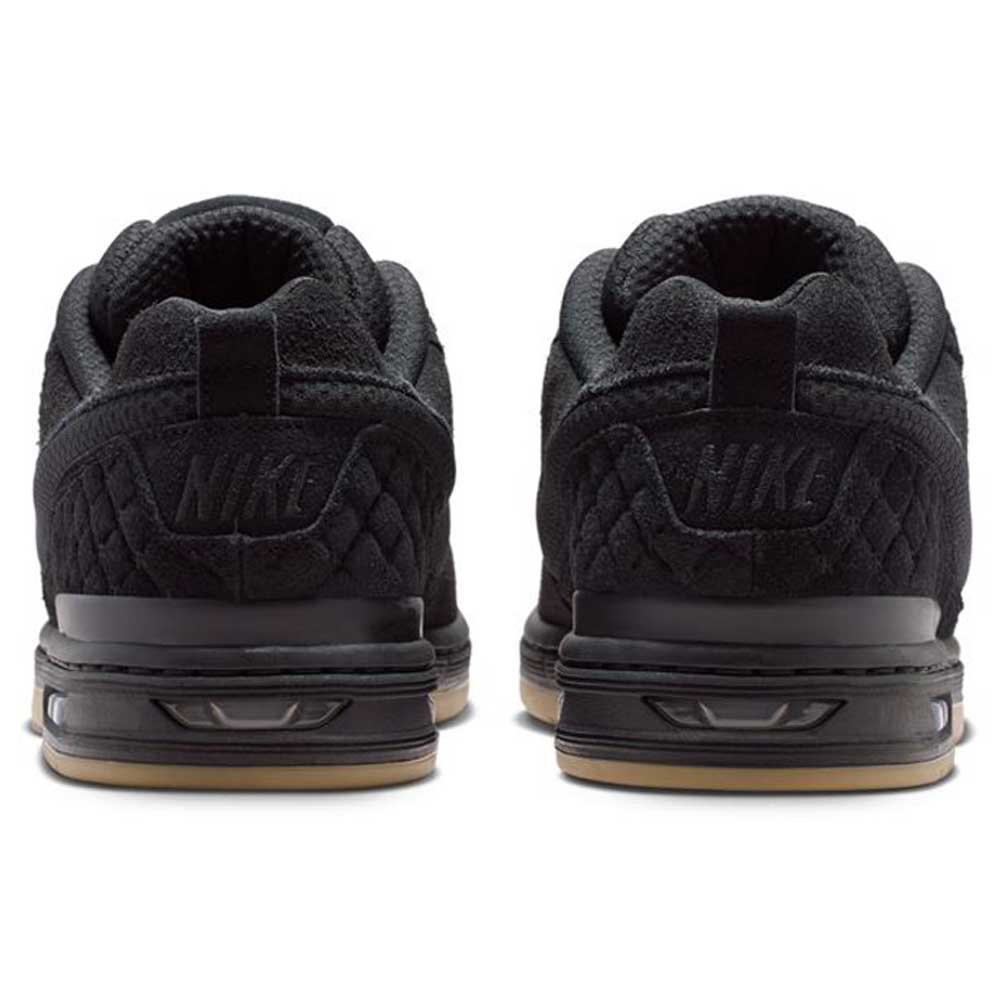 The IQ6827001 Black Gum Light Brown Paul Rodriguez Zoom Air Low Suede Skateboarding Shoes feature a black suede upper, NIKE branding on the heels, quilted detailing, and gum-colored rubber outsoles, viewed from the back.