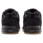 The IQ6827001 Black Gum Light Brown Paul Rodriguez Zoom Air Low Suede Skateboarding Shoes feature a black suede upper, NIKE branding on the heels, quilted detailing, and gum-colored rubber outsoles, viewed from the back.