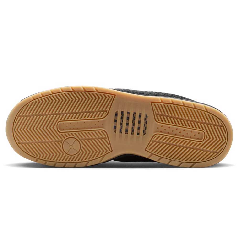 The image shows the sole of the IQ6827001 Black Gum Light Brown Paul Rodriguez Zoom Air Low Suede Skateboarding Shoes, featuring a gum rubber outsole with patterned tread, a circular heel logo, and a rectangular midfoot window revealing Zoom Air cushioning.