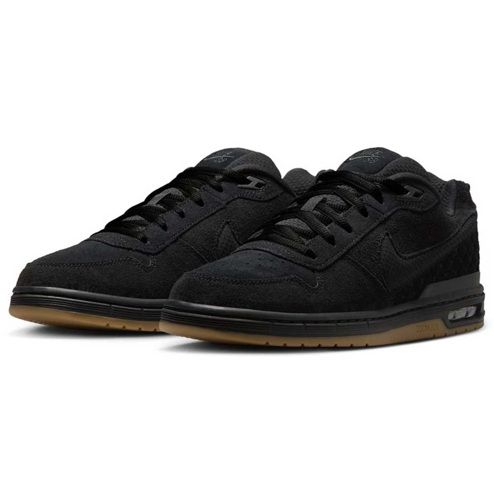 The IQ6827001 Black Gum Light Brown Paul Rodriguez Zoom Air Low Suede Skateboarding Shoes feature black suede and leather uppers, black laces, dark gum light brown outsoles, a visible Nike swoosh, and a modern sporty design.