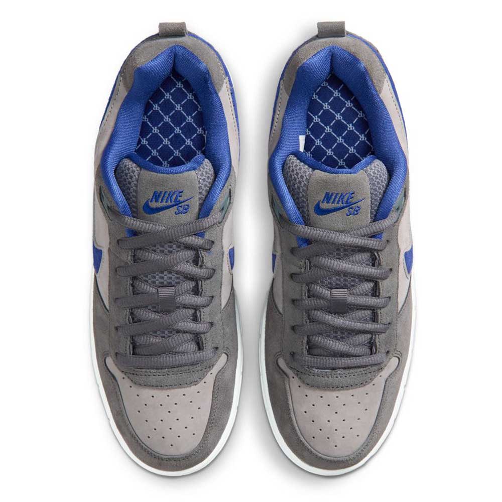 Top view of the IU7835001 Flint Grey Deep Royal Blue Paul Rodriguez Zoom Air Low Suede Skateboarding Shoes, featuring blue logos on the tongues, patterned insoles, grey laces, a suede upper, perforated toes, and durable traction.