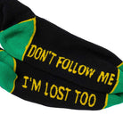 The I'm Lost Too Black Green Yellow Anti Hero Socks feature green toes, yellow writing—one sock says "DONT FOLLOW ME," the other "IM LOST TOO"—making them a fun, humorous addition to your skateboard socks collection.