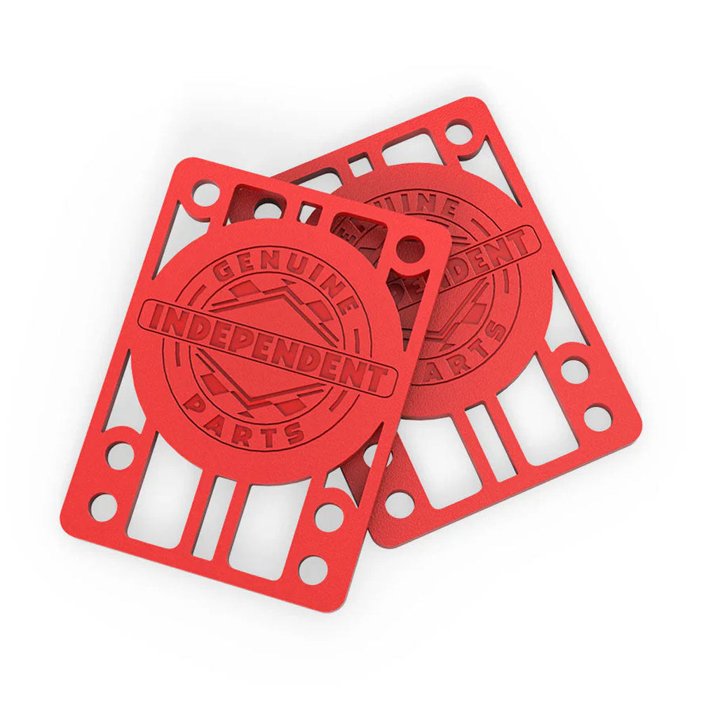 Two red Independent Riser 1/8th pads from a set of two, crafted from durable TPU and stacked slightly askew, each featuring the Independent Genuine Parts logo embossed in the center.