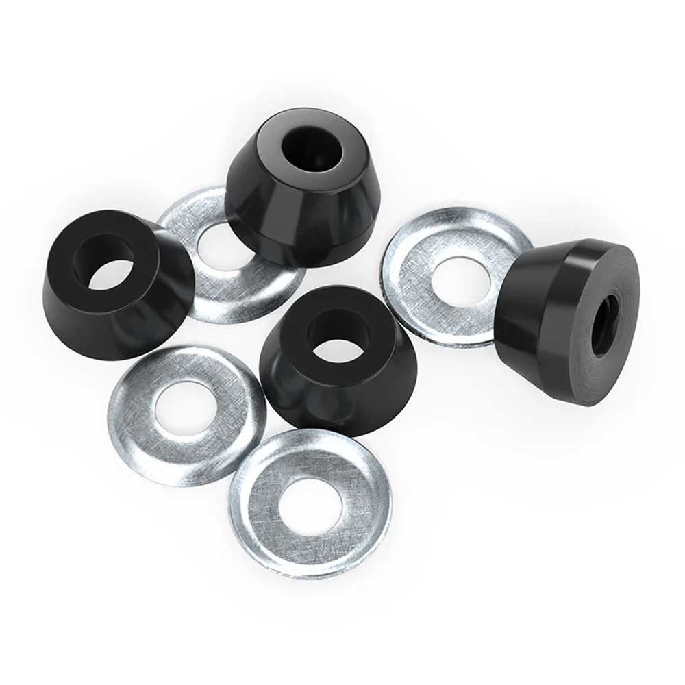 Four Indy Standard Conical Hard 94A Black skateboard bushings and four silver washers are arranged on a white background. The cylindrical high-rebound urethane bushings, each with a center hole, pair with flat washers for independent suspension.