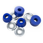 Four silver metal washers and four blue Indy Standard Cylinder Cushions Medium Hard 92A are arranged on a white background. The cushions have center holes matching the washers, ideal as skateboard truck bushings.