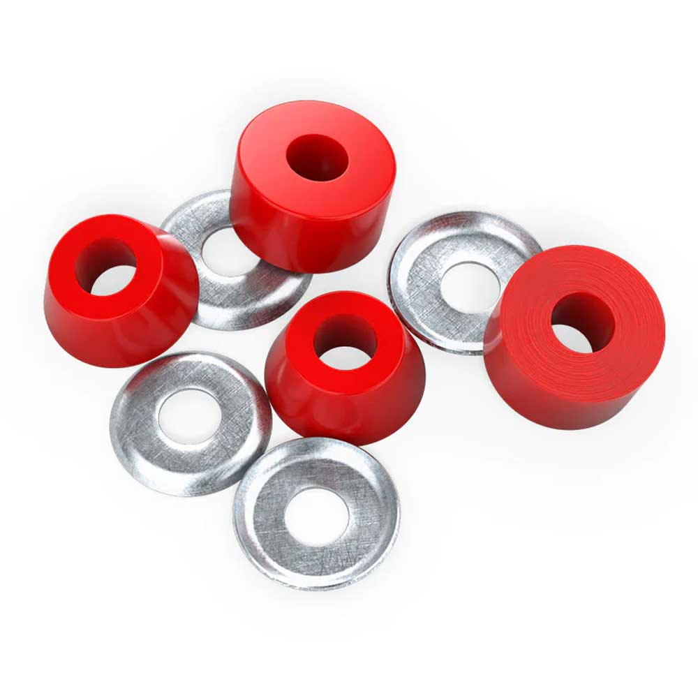 Four Indy Standard Cylinder Cushions Soft 88A Red and four silver washers are arranged on a white background. These high rebound urethane bushings with a central hole pair perfectly with skateboard trucks.